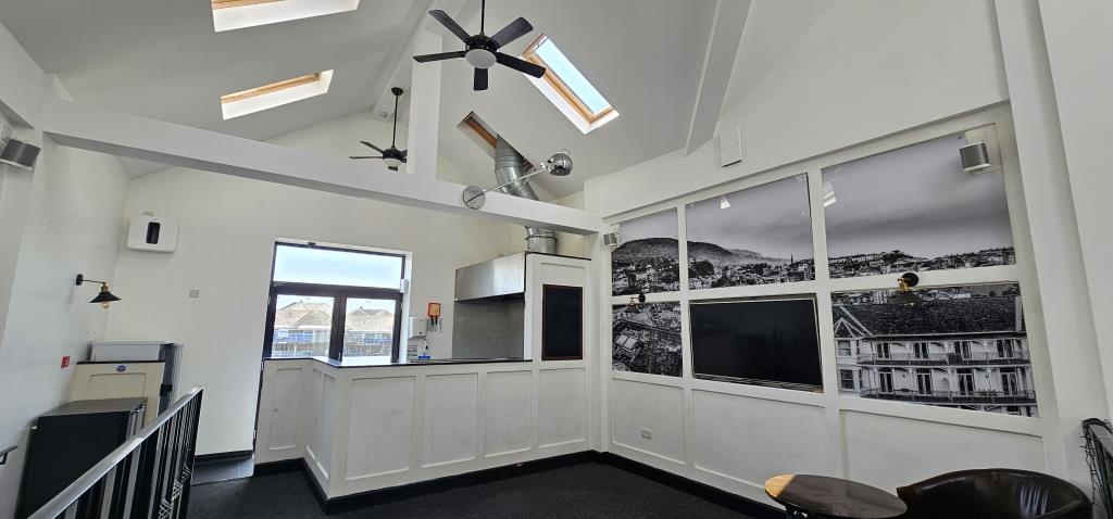 Lot: 79 - TOWN CENTRE FREEHOLD THREE STOREY BAR WITH GARDEN AND PARKING - View towards the food prep area